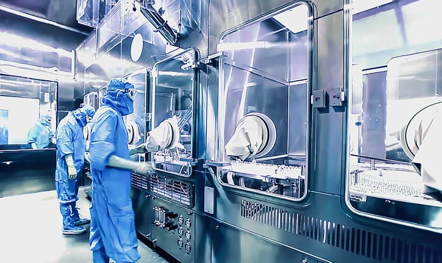 Engineers in cleanroom